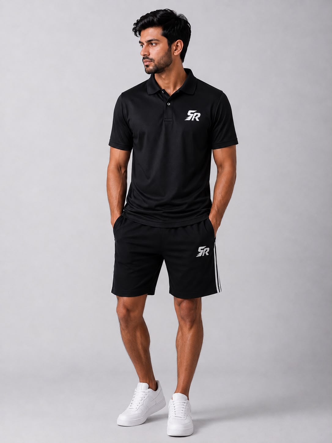 SmashNRun Shadow90 Polo in black worn with black Shadow90 shorts