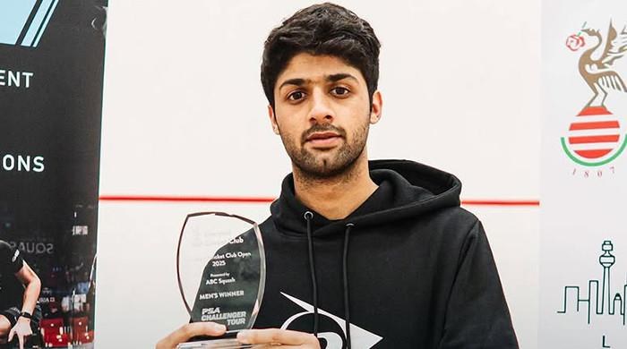 Noor Zaman with a trophy